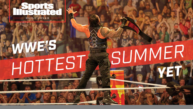 Daily Cover image: Roman Reigns faces a raucous crowd. Text reads "WWE's Hottest Summer Yet"